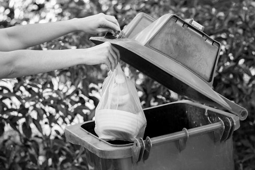 Workers sorting commercial recyclables into separate streams